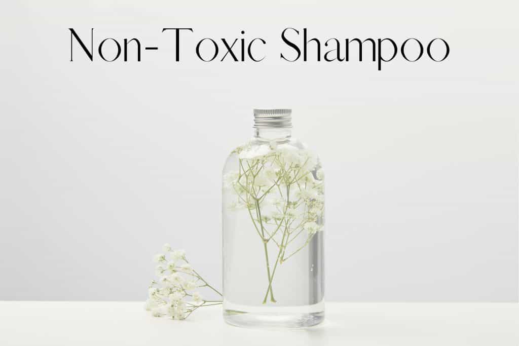 Clear shampoo bottle with flowers in it