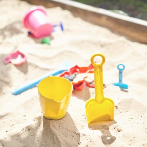 sandbox with kids toys