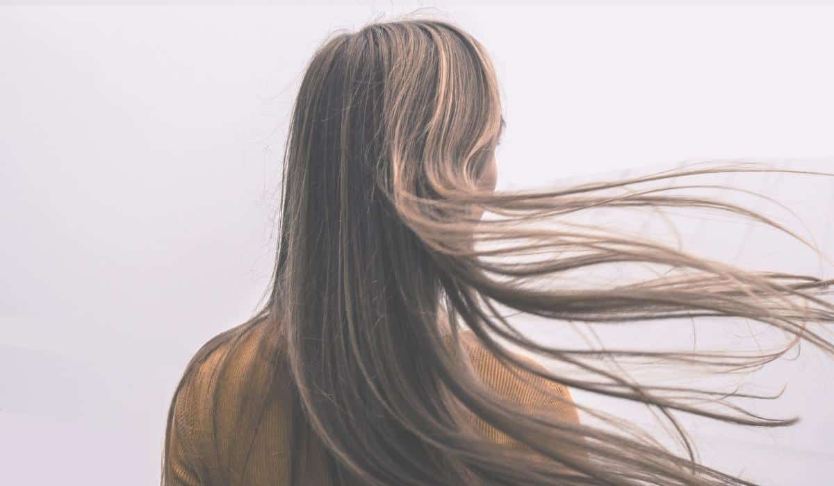 woman with hair blowing in the wind