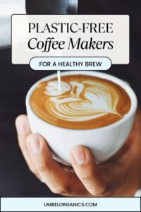 holding cup of coffee