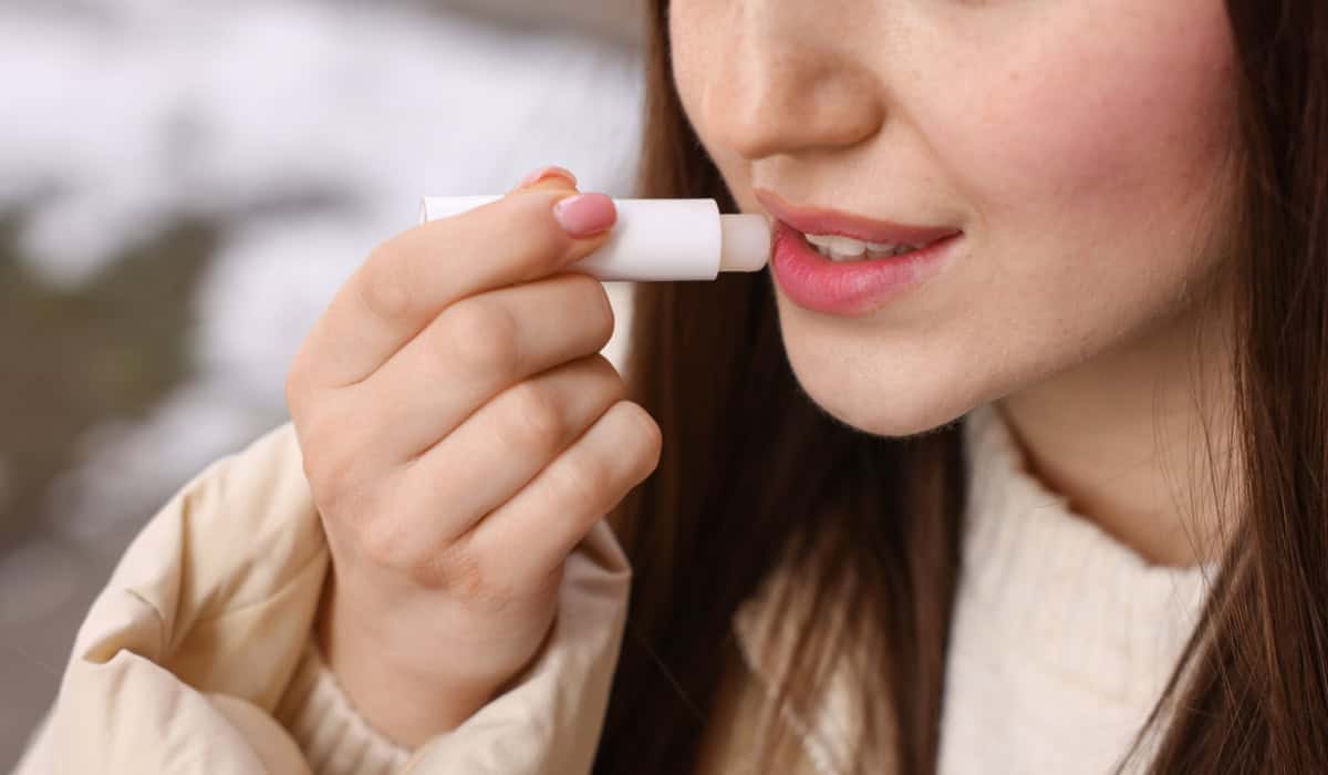 applying lip balm